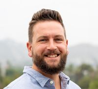 Young smiling guy with a beard